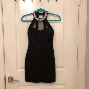 Black dress with pearl collar